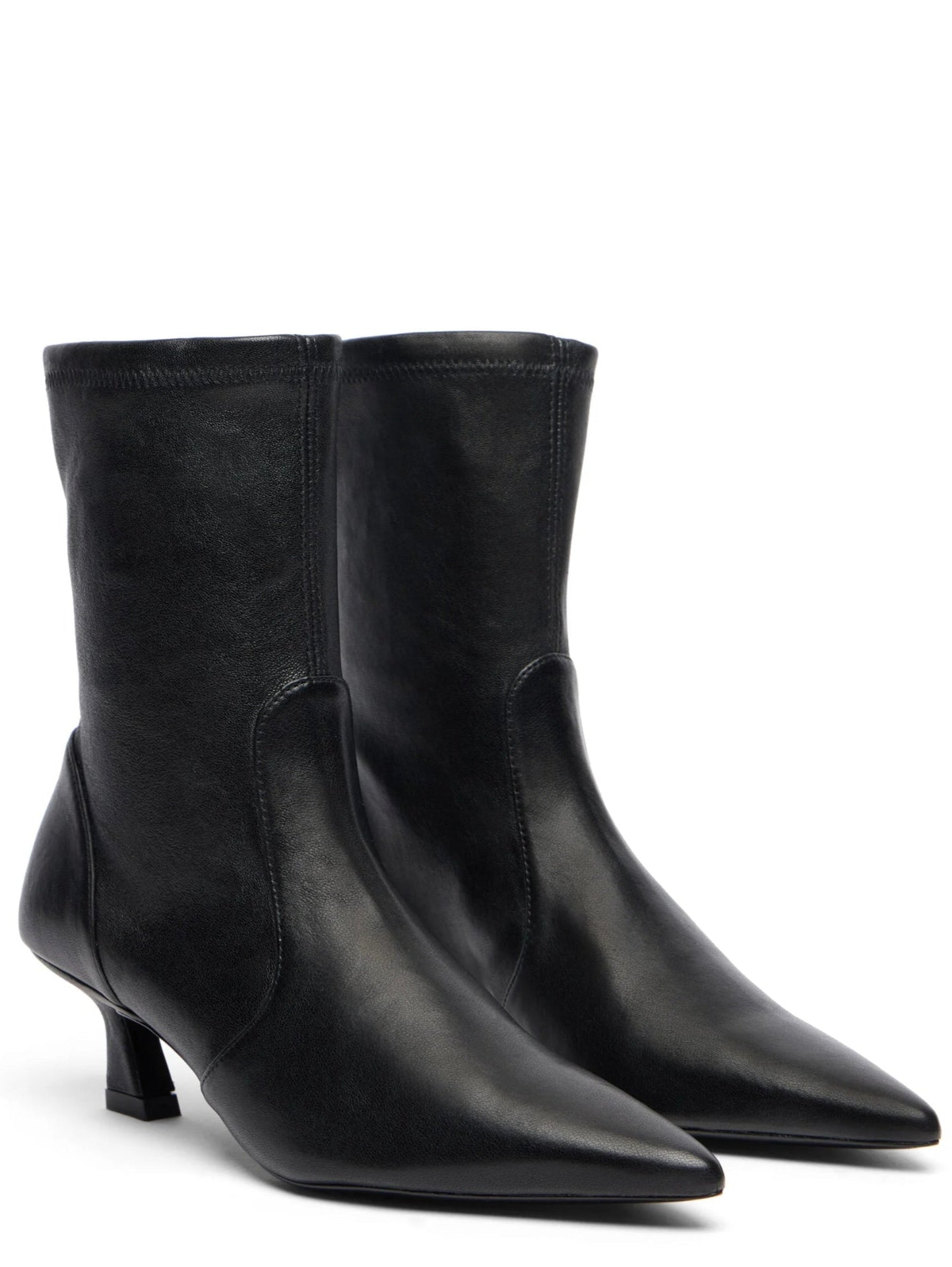 Pair of black ankle boots on a white background