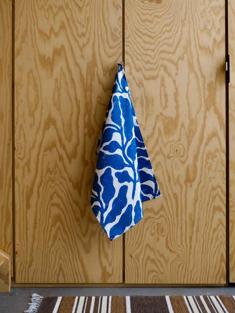 Leaves linen tea towel by Linnéa Andersson, blue