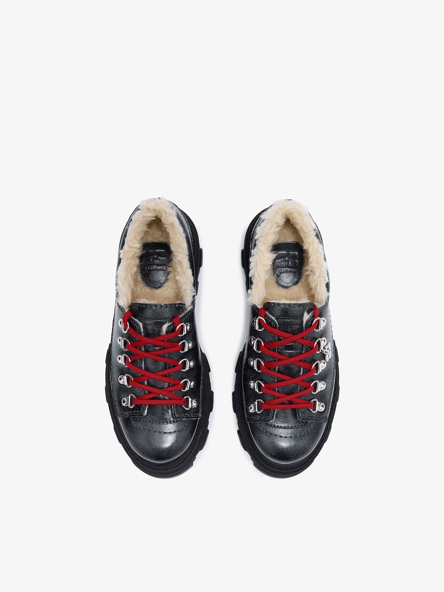 Grey boots with red laces and fur lining on a white background