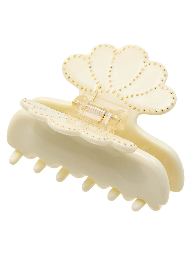 Cream-colored hair clip with pearl-like embellishments on a white background