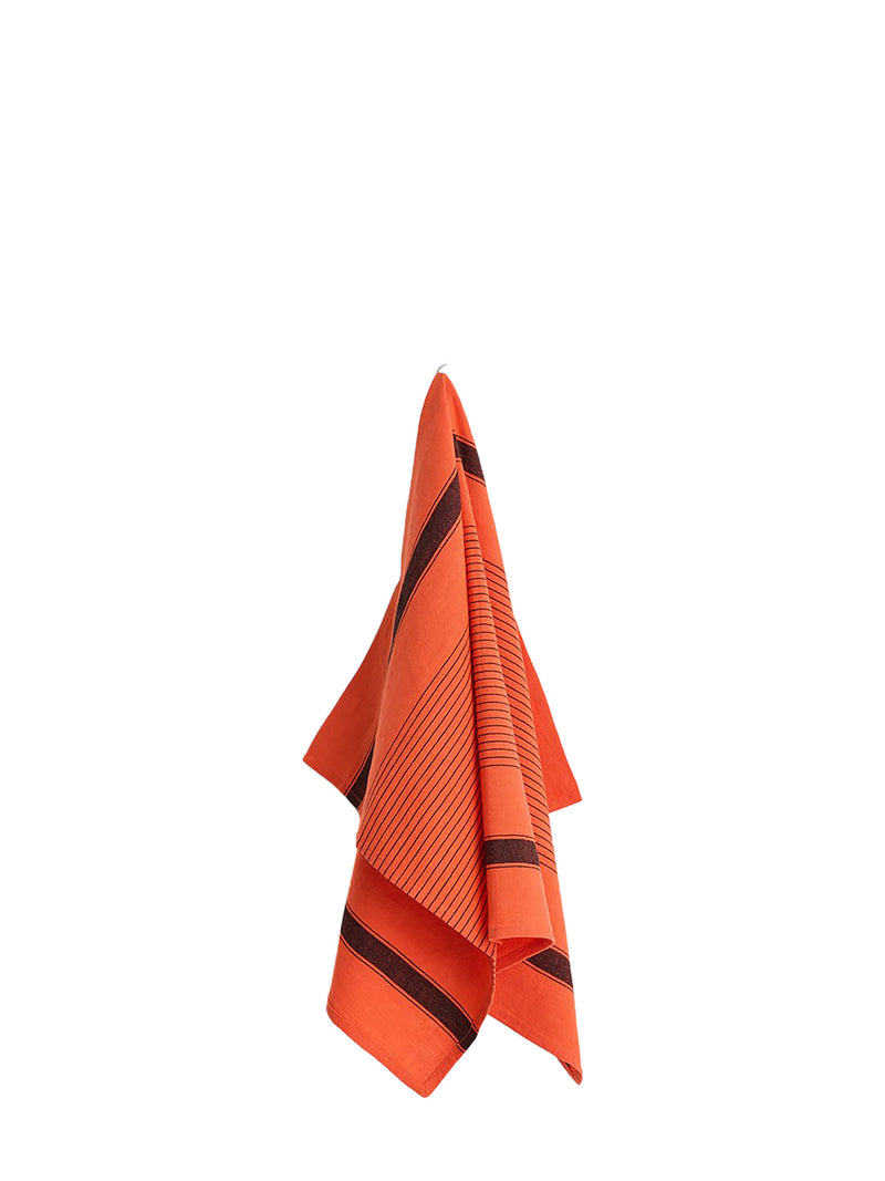 Orange towel with black stripes on a white background