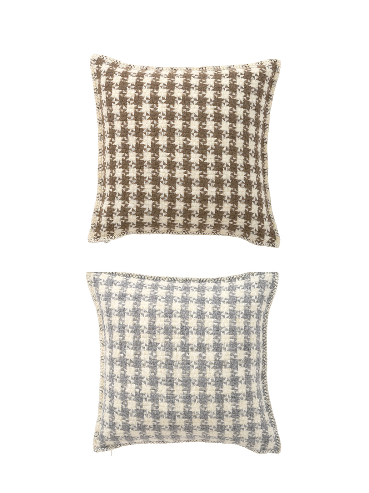 Two wool cushions with dogtooth woven pattern