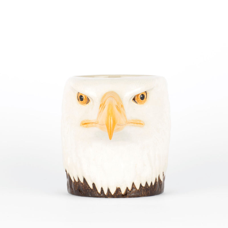 Ceramic mug with an eagle face design on a white background