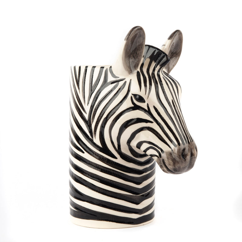 Ceramic zebra head on a white background