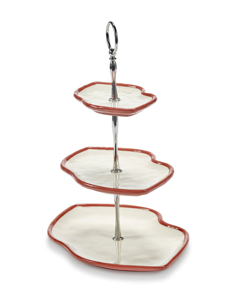 Three-tiered ceramic serving tray with a decorative handle on a white background