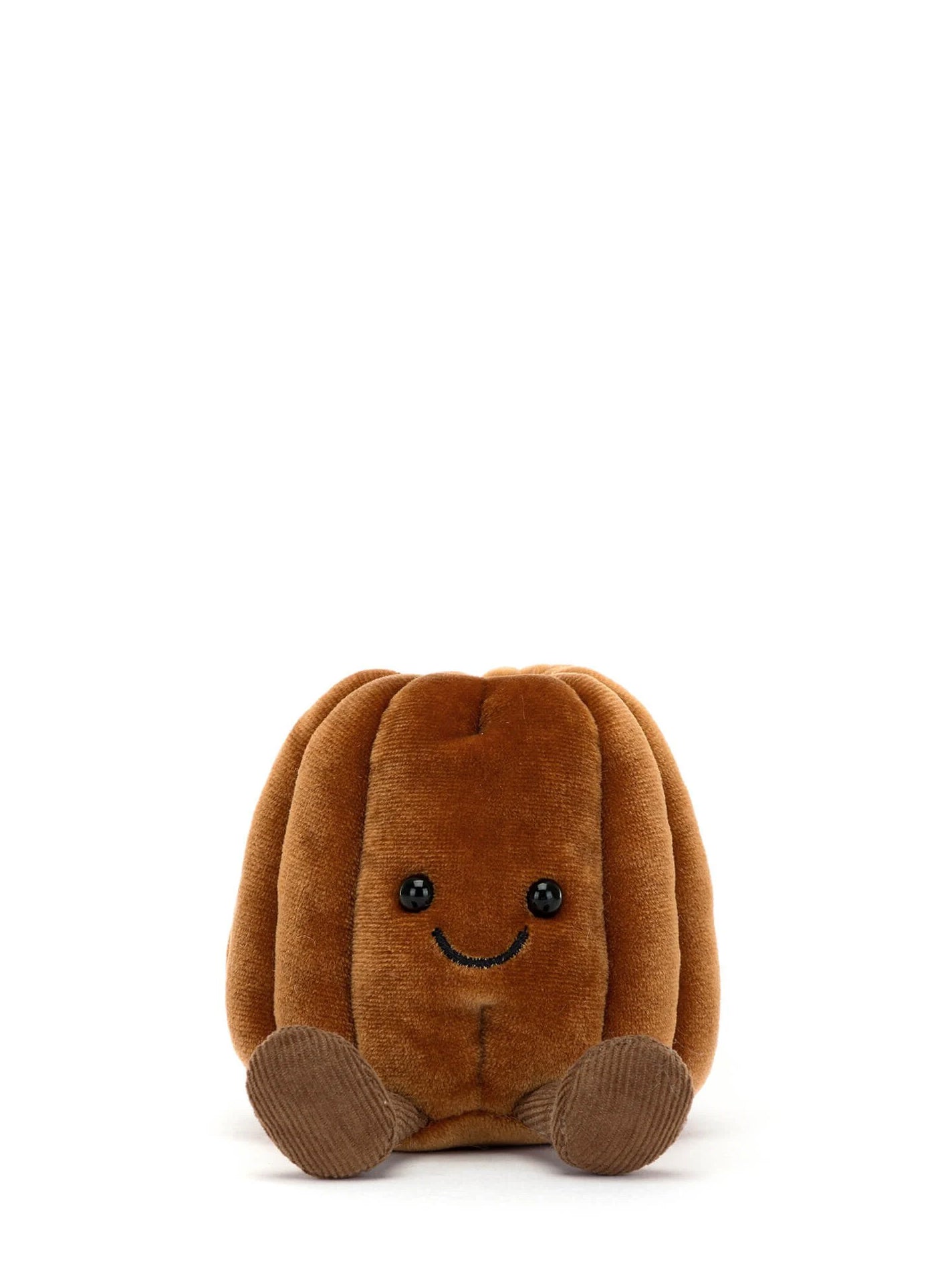 Brown plush toy with a smiling face on a white background