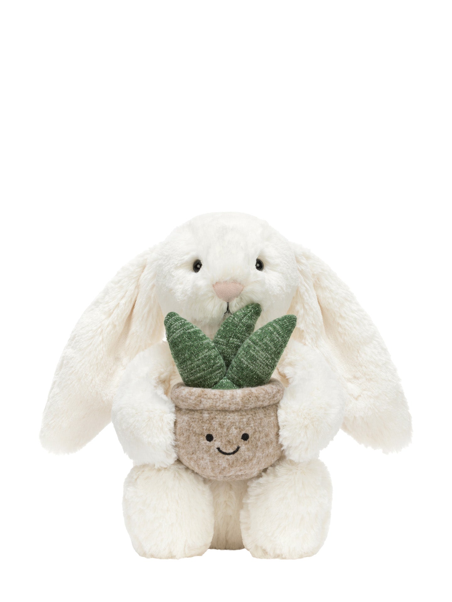 Plush toy rabbit from Jellycat sits here holding a potted succulent plant soft toy on a white background