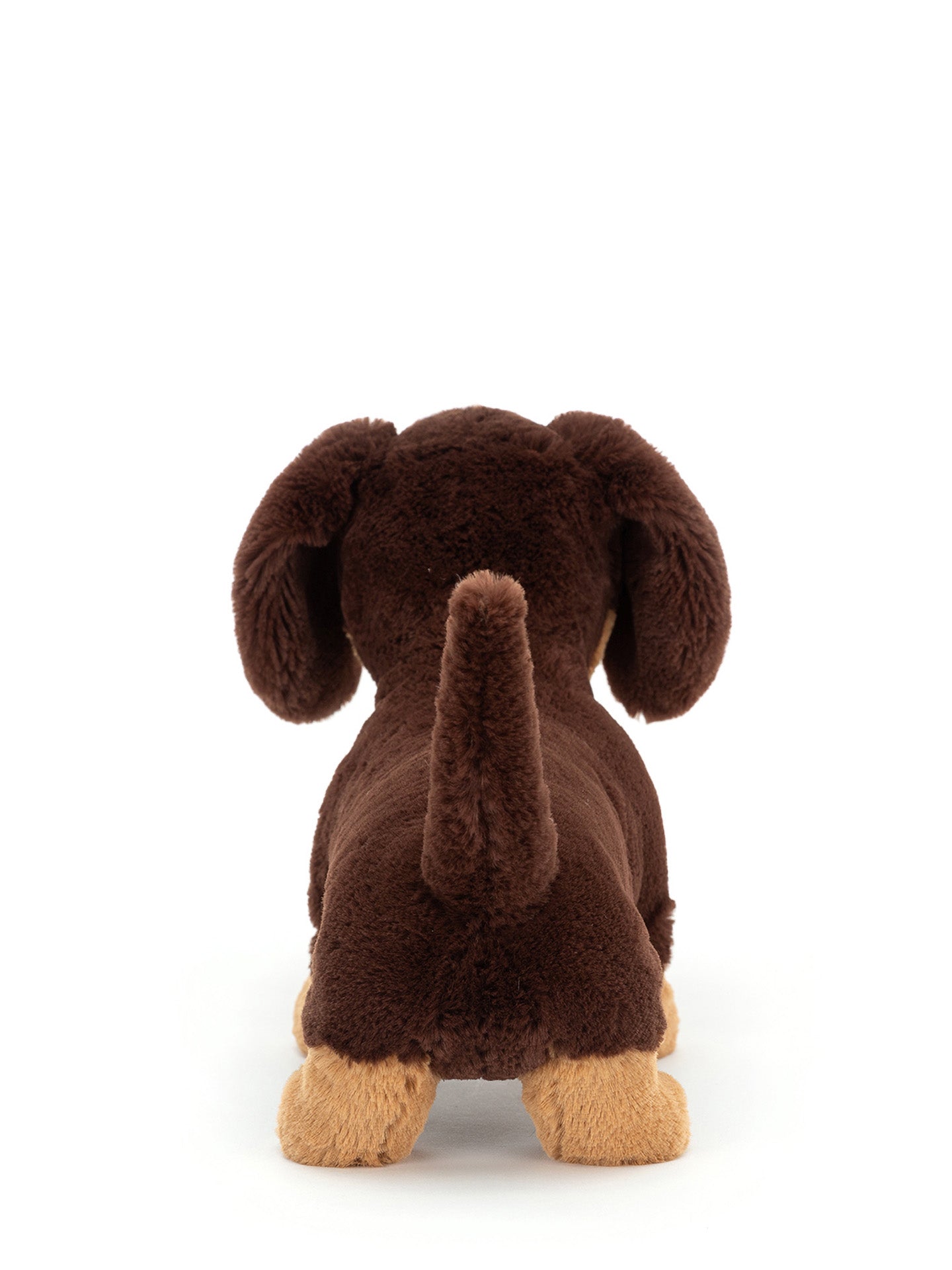 What a rump! Brown plush dog toy Otto the daxie has soft paws and preppy tail.
