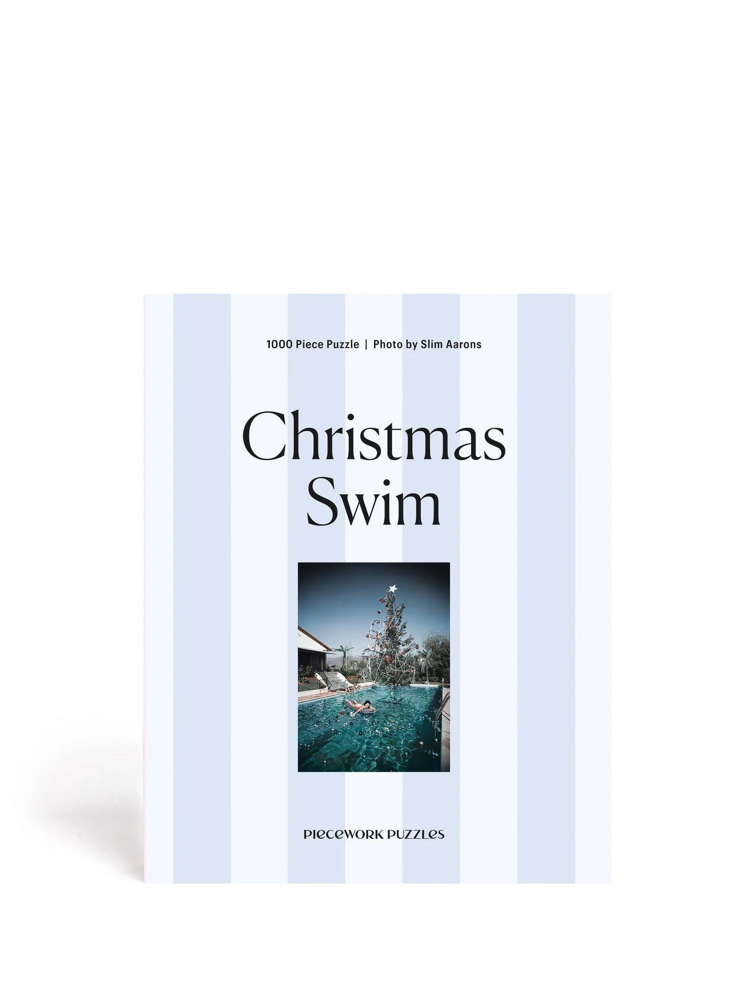 Puzzle box titled 'Christmas Swim' with a pool scene on a light blue background