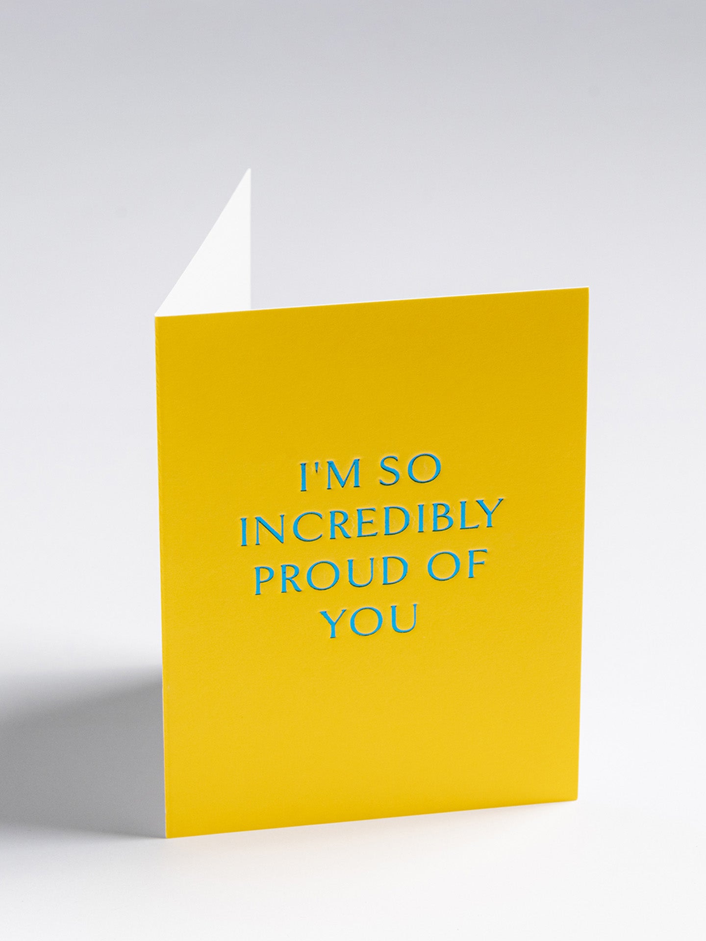 So proud, yellow mini graduation card