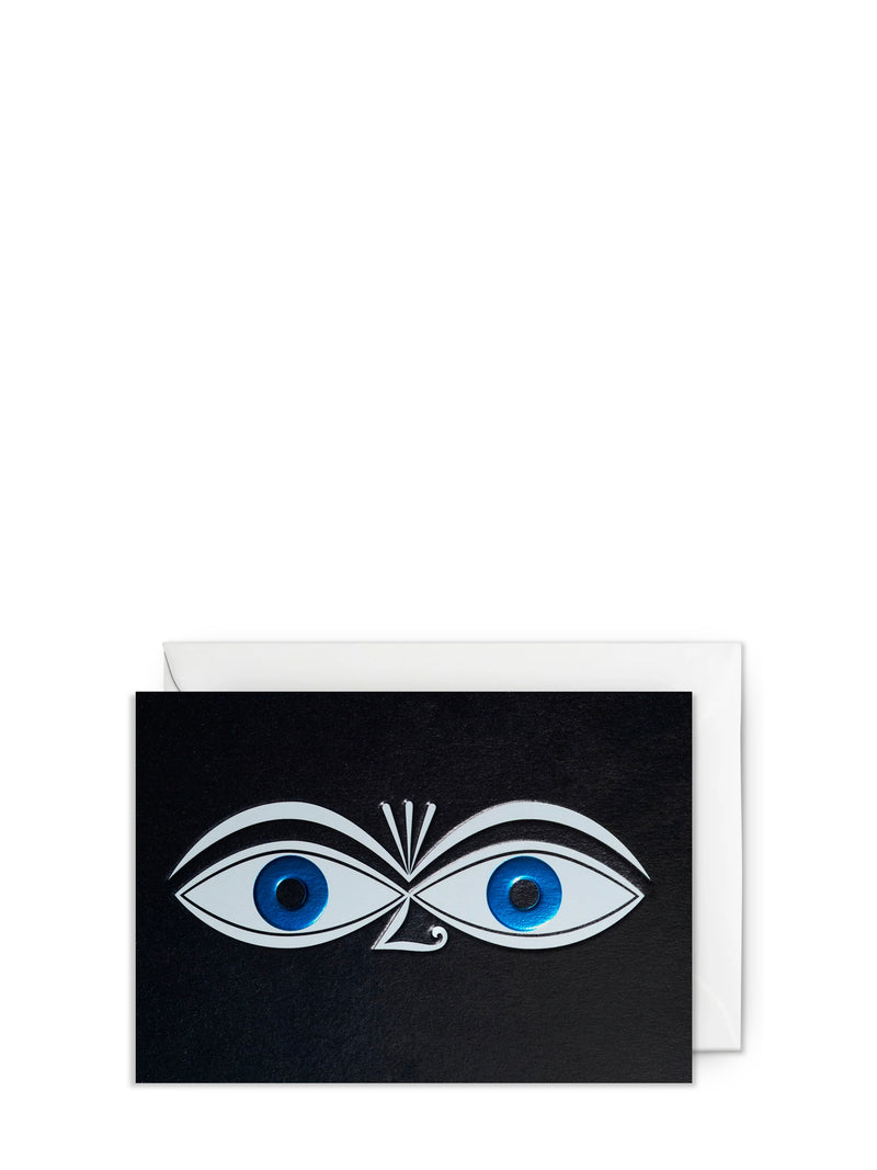 Greeting card with eye design on a black background