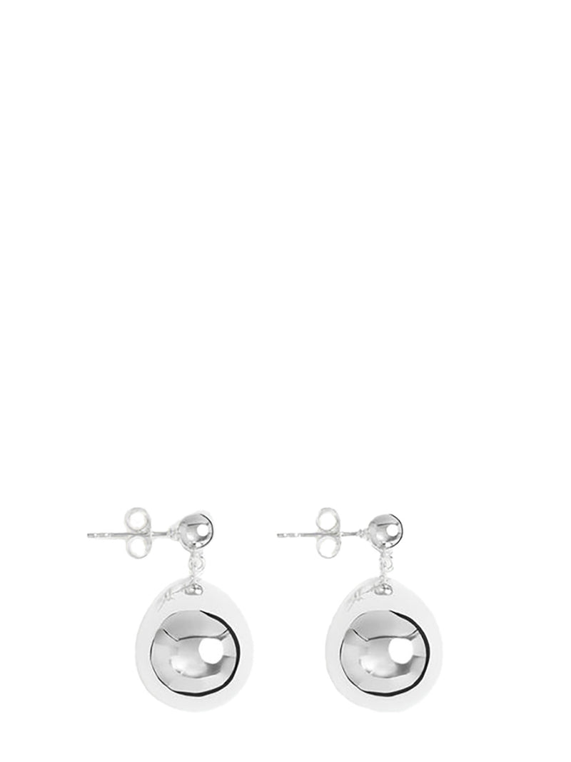 A pair of silver teardrop-shaped dangle earrings with a polished reflective finish and butterfly backings, shown against a solid white background.