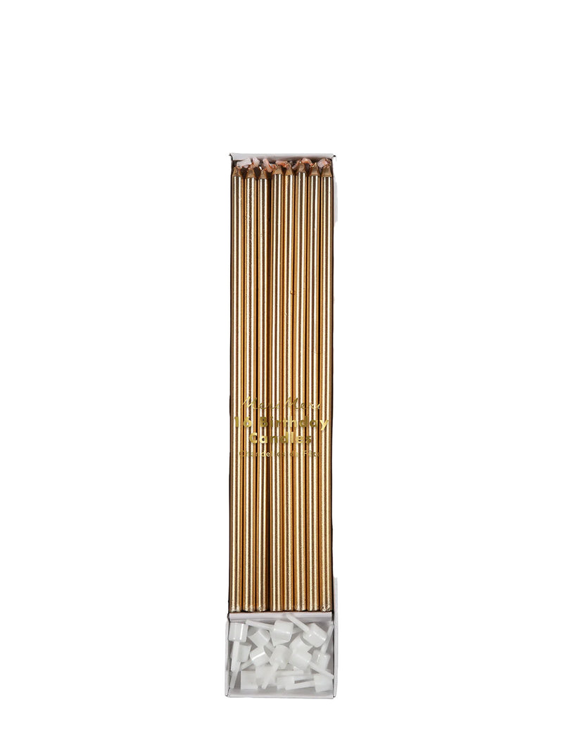 Long thin golden candle pack of 16 metallic shiny candles with white holders included in the set on a white background