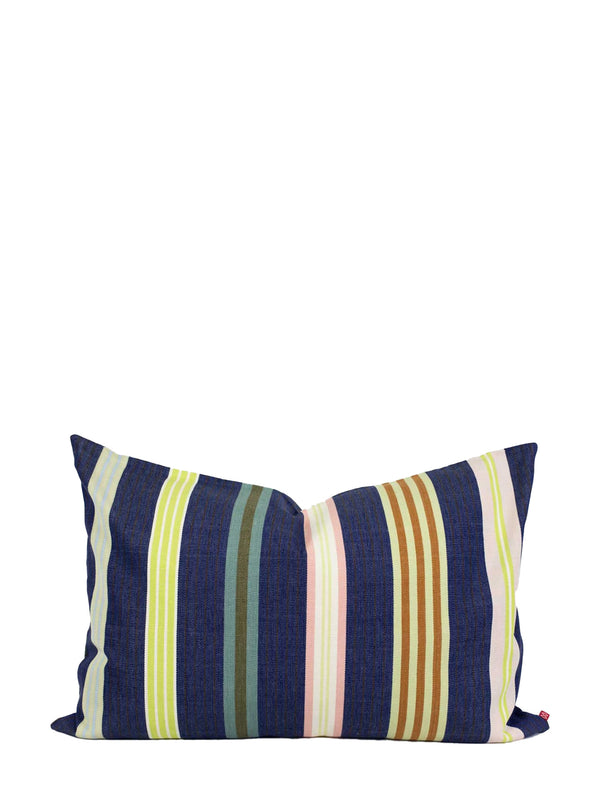 A square throw pillow with vertical stripes in navy blue, olive green, light green, pink, brown, and yellow, set against a plain white background.