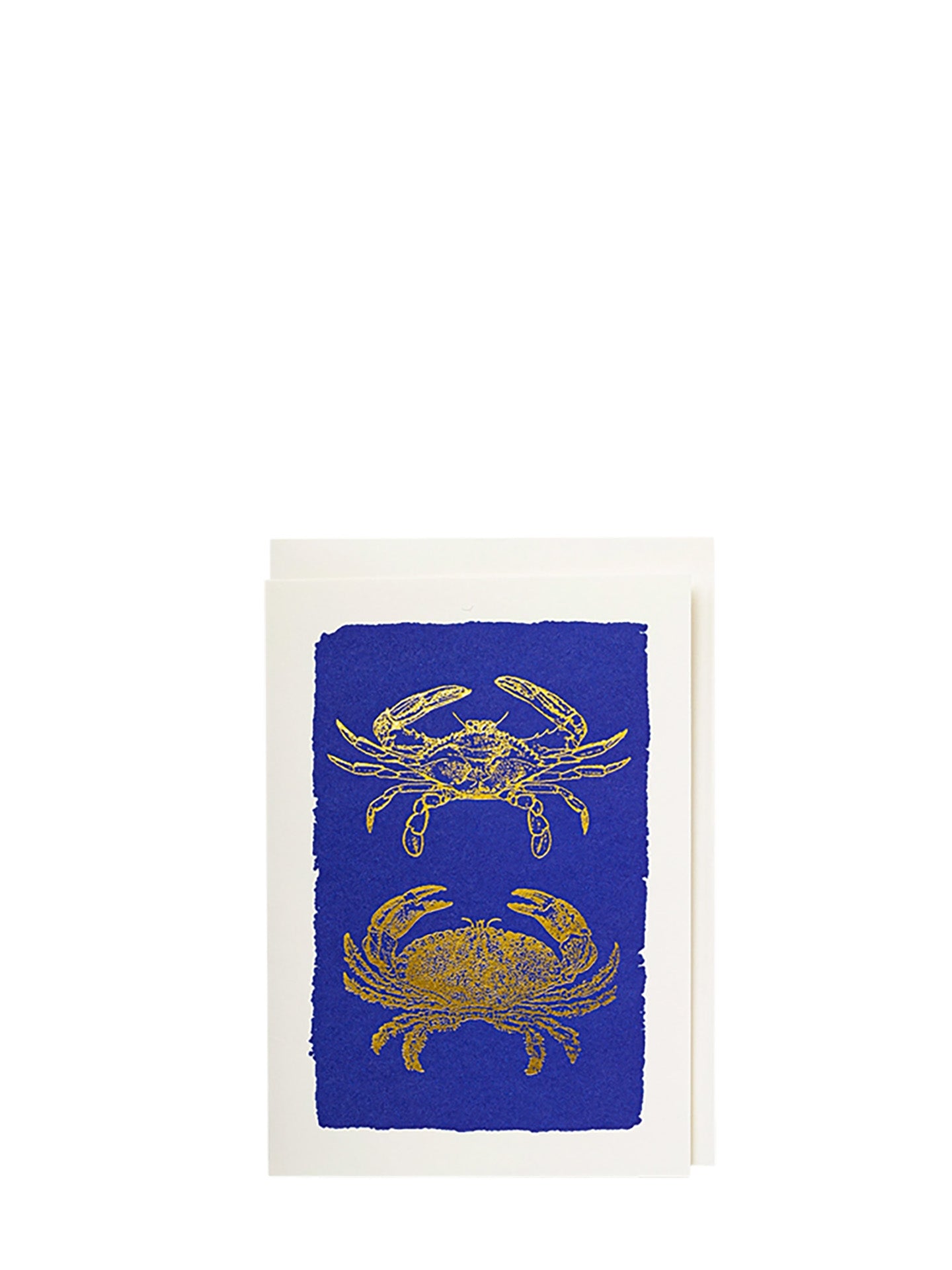 Framed artwork with gold crab design on a blue background