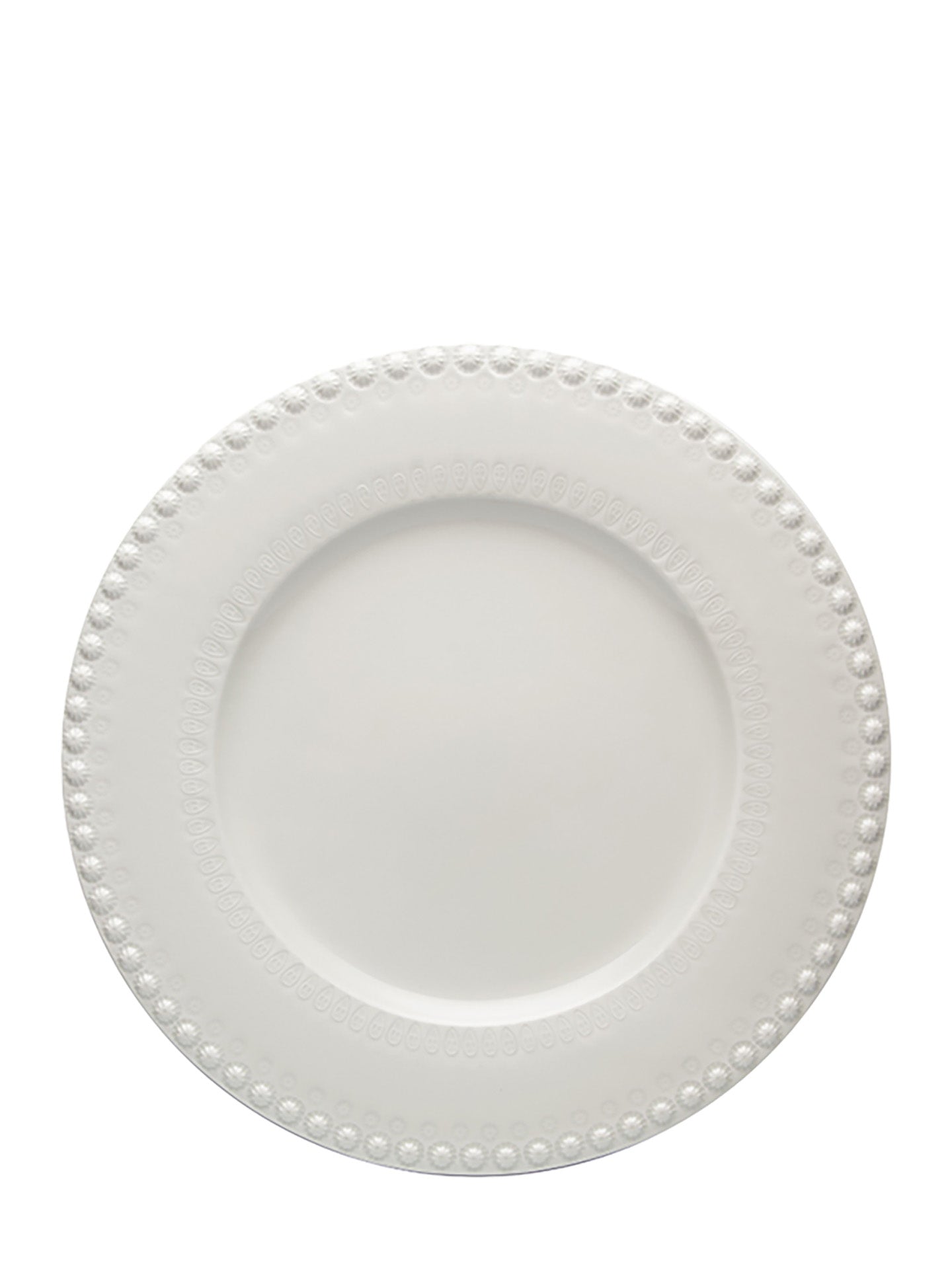 White ceramic plate with decorative edge on a white background
