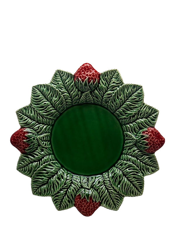 Decorative mirror with green leafy design and red berries on a white background