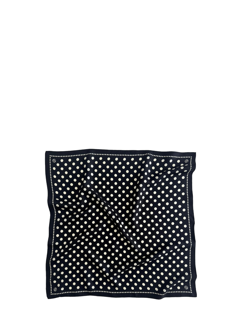A square black square scarf with a white polka dot pattern and a white dotted border, laid flat on a solid white background.