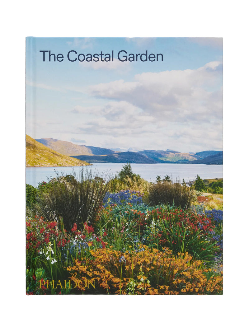 Book cover of 'The Coastal Garden' with a scenic view of a garden and lake.