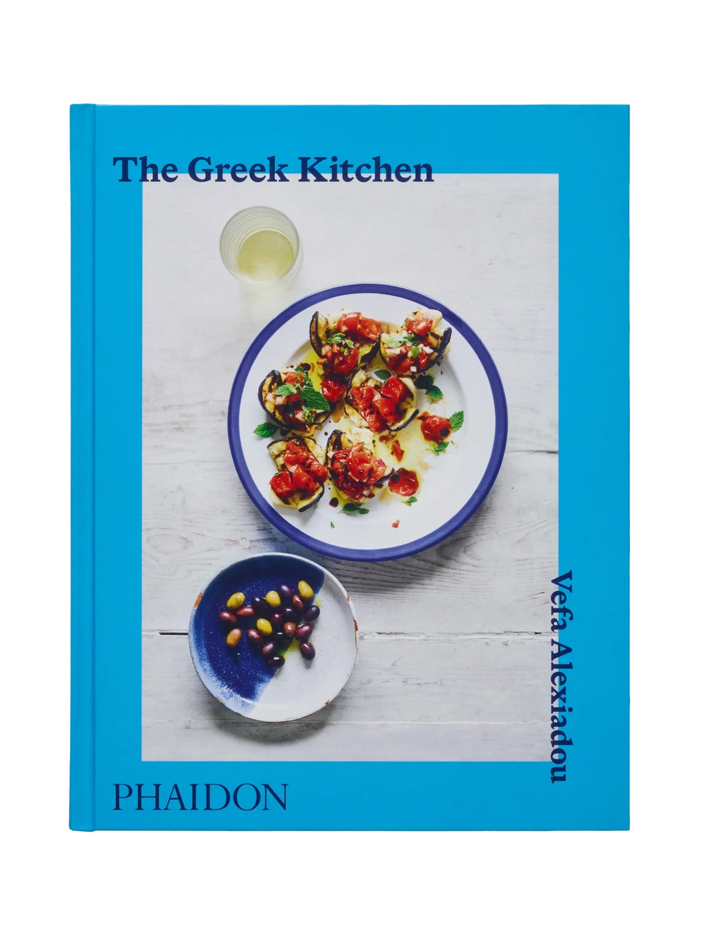 Book cover of 'The Greek Kitchen' by Phaidon with a photograph of Greek cuisine.