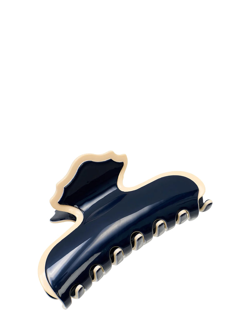A glossy navy blue hair claw clip with a gold-tone metal edge and teeth, shown on a plain white background.
