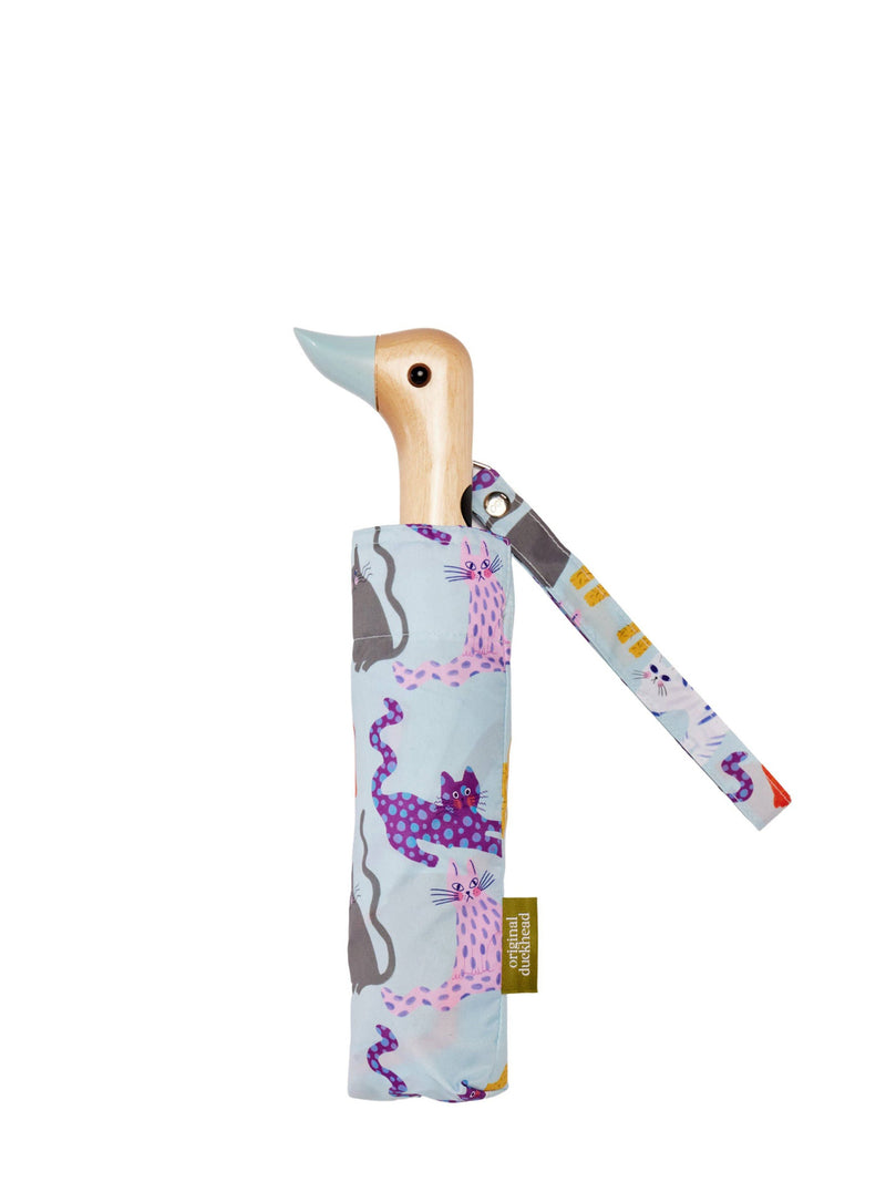 Compact umbrella with a duck-shaped handle on a white background