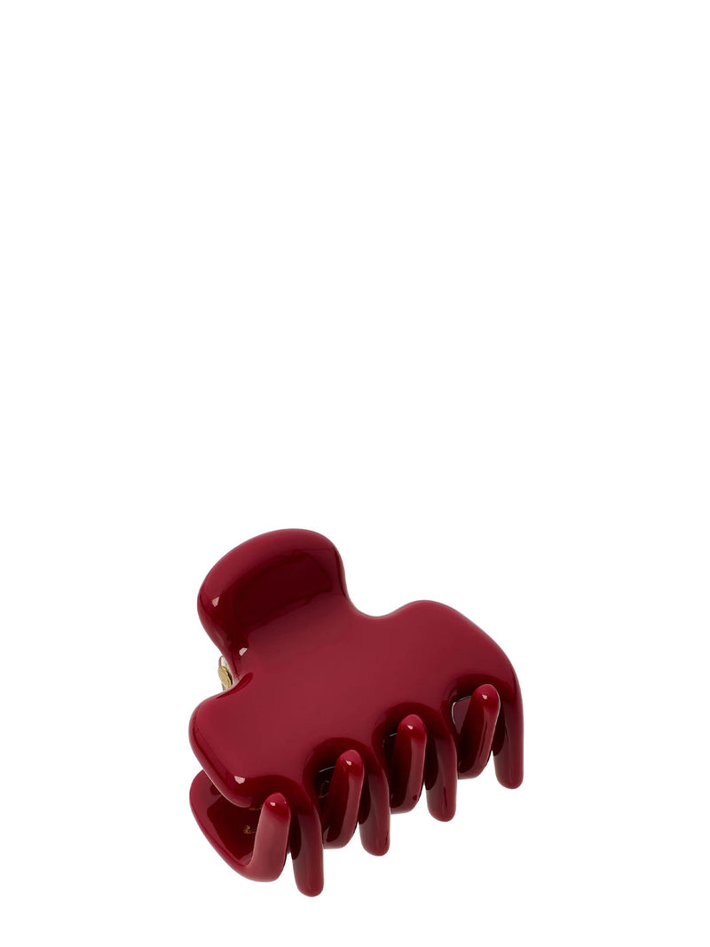 A glossy deep red hair claw clip shown on a plain white background.