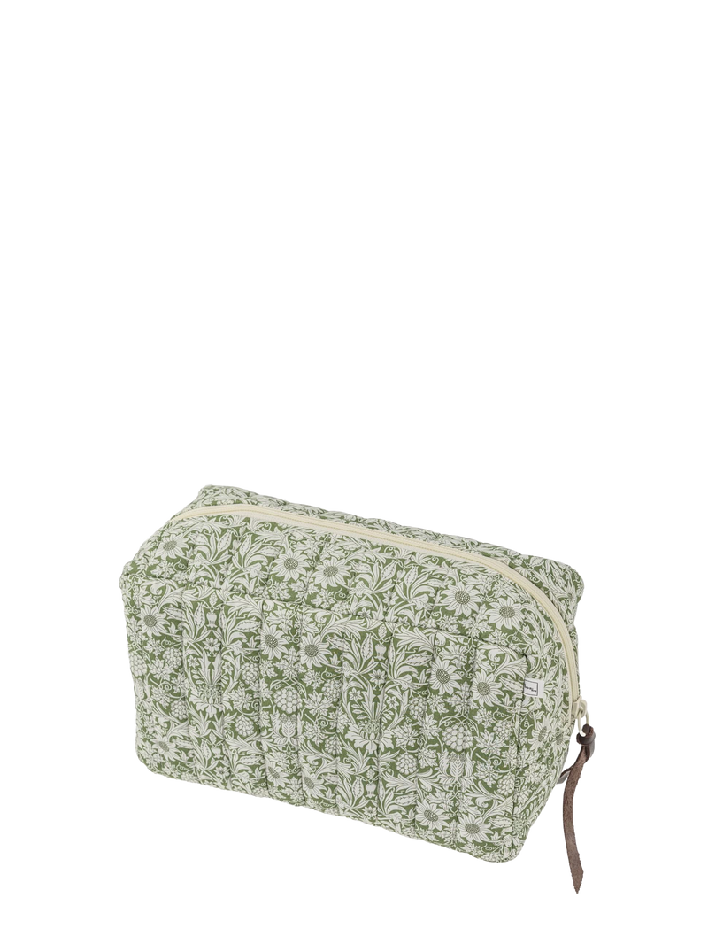 Green floral-patterned pouch on a white background