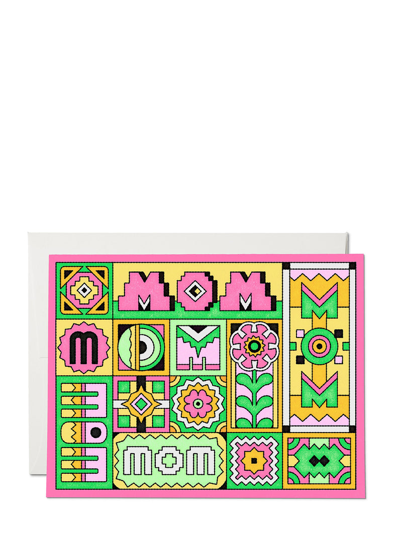 Colorful card with geometric patterns and 'Mom' text on a white background