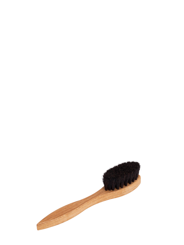Shoe polish applicator brush with handle