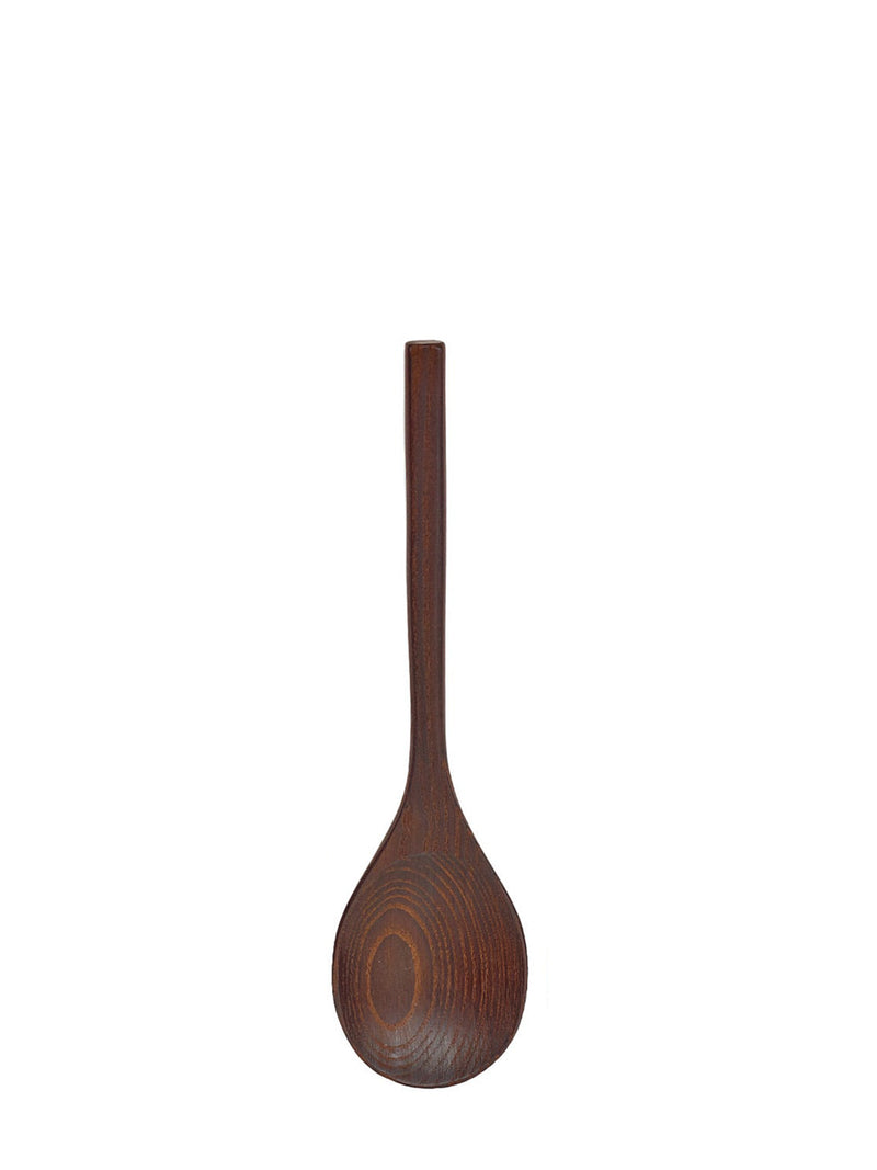 Wooden spoon on a white background