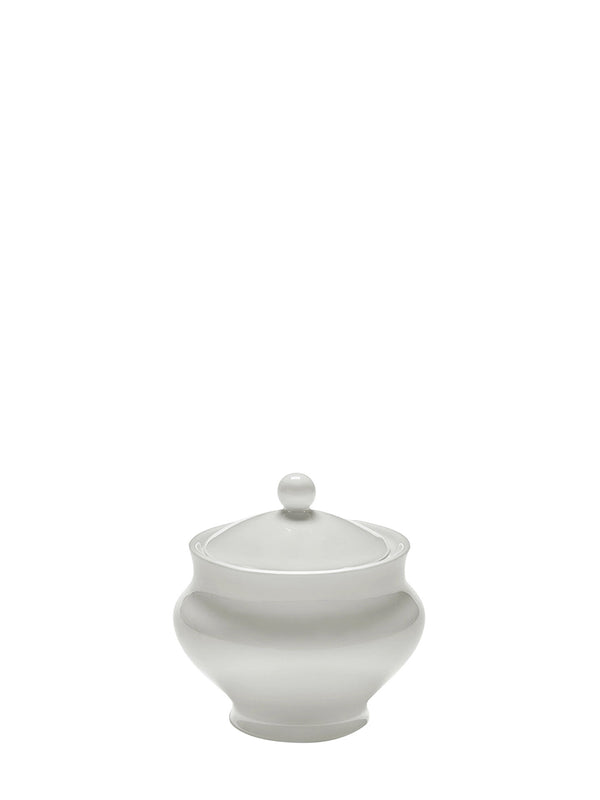 White ceramic sugar bowl with a lid on a white background