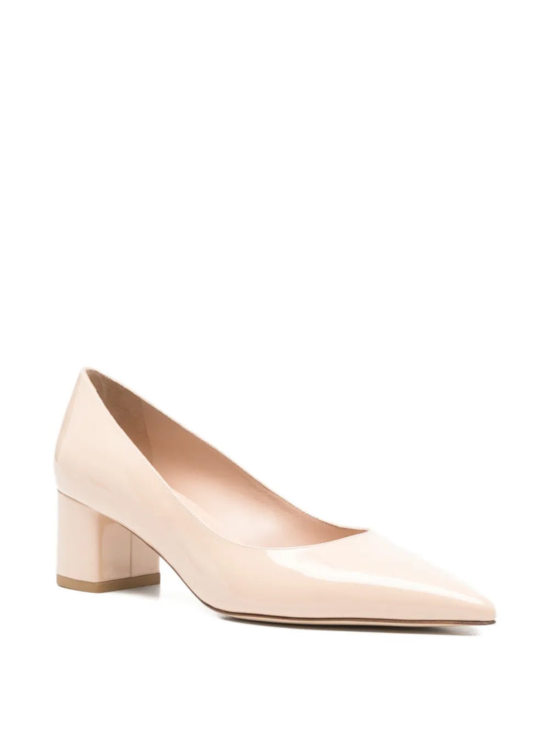 Beige high-heeled shoe on a white background