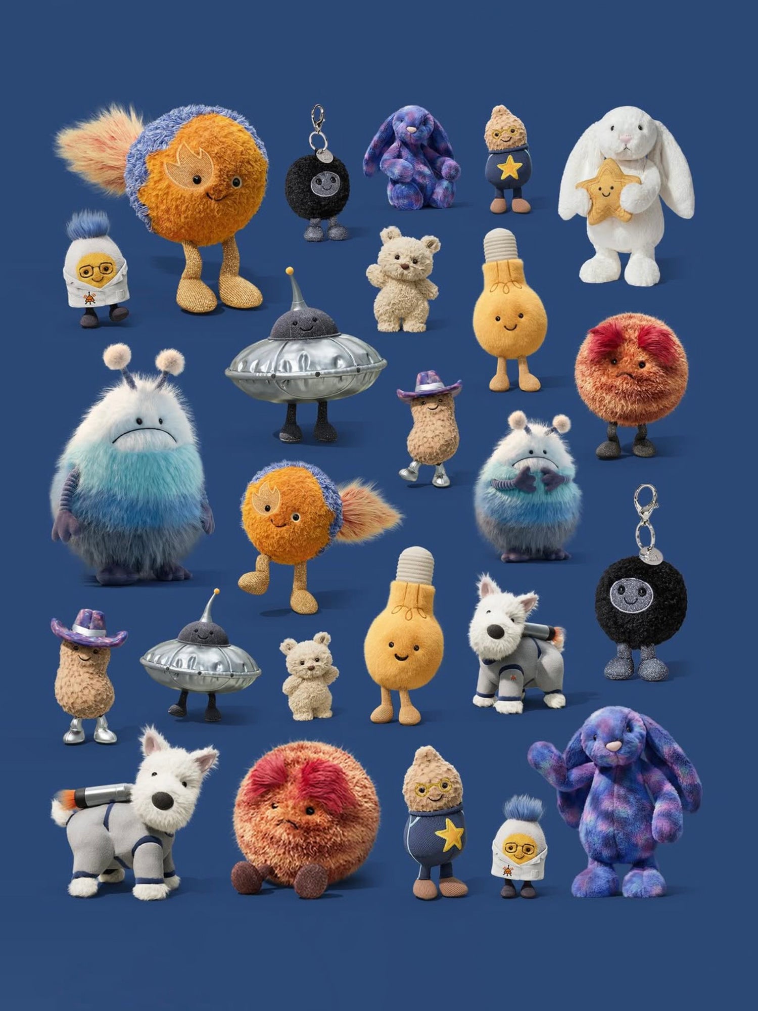 Collection of various plush toys and keychains on a blue background