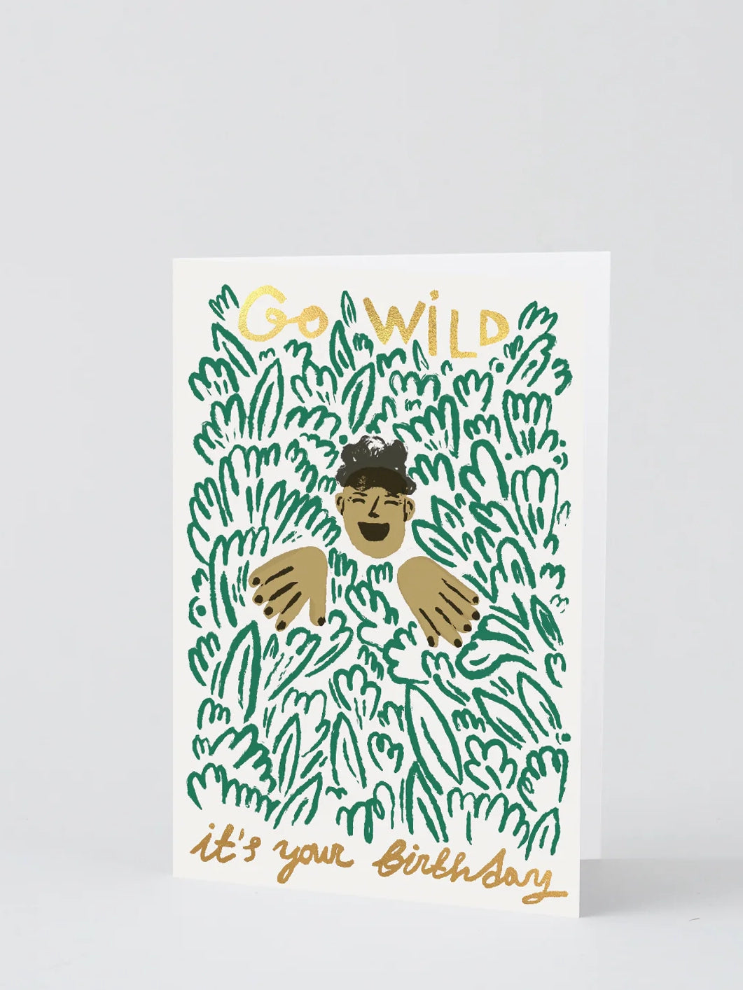 Greeting card with a person surrounded by green foliage and 'Go Wild it's your birthday' text on a white background