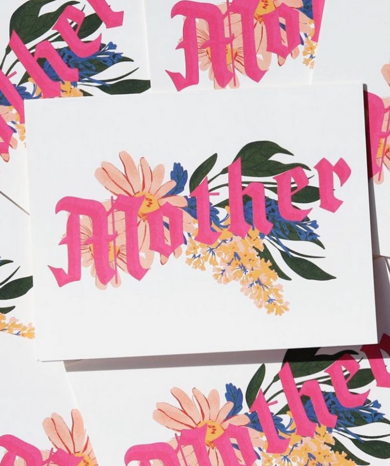 Card with 'Mother' text surrounded by floral designs on a matching background