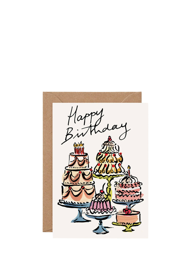 Birthday card with illustrations of cakes and 'Happy Birthday' text on a white background.