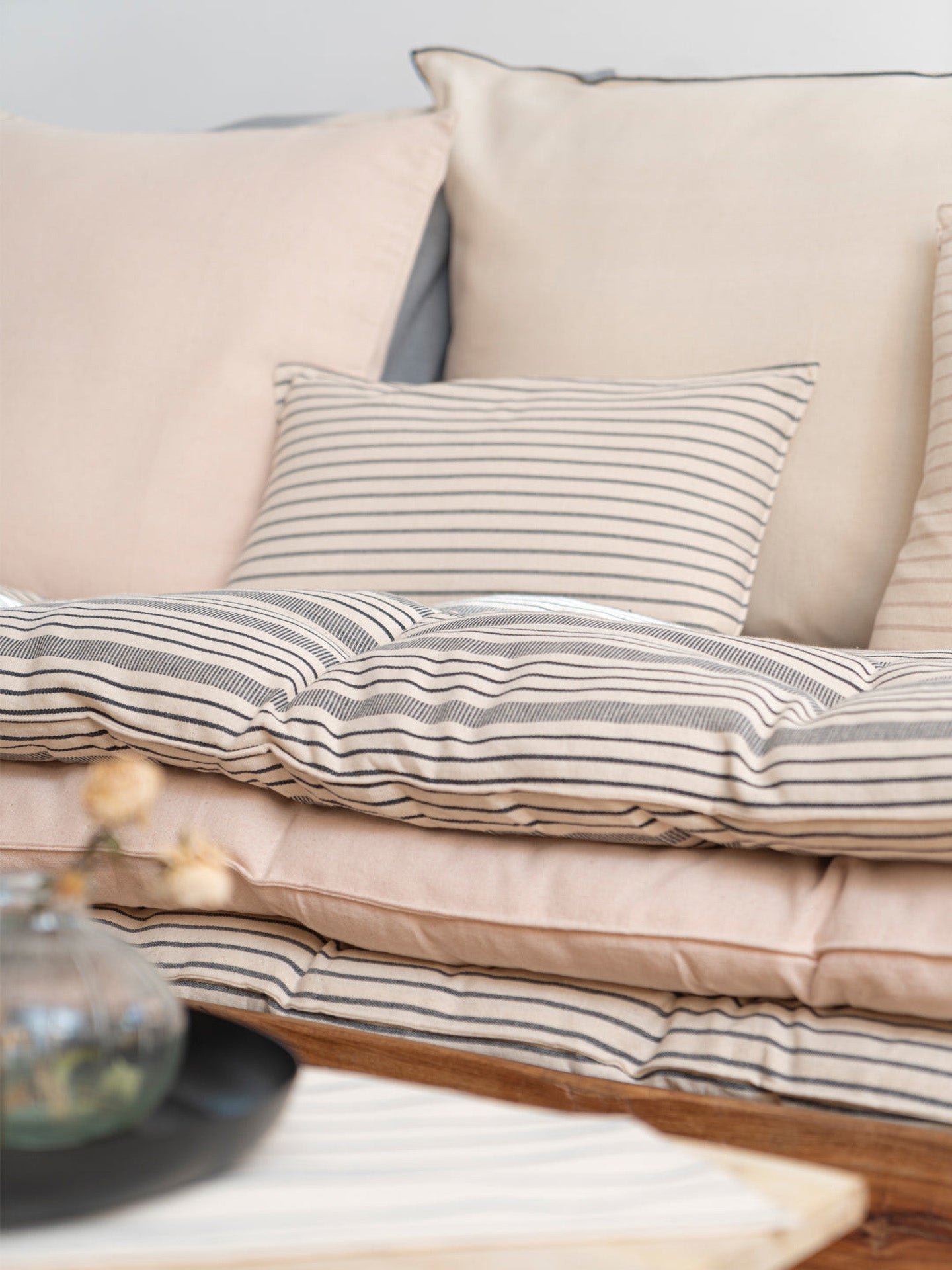 Cushion no 1 solid ivory w/black edges, 50 x 50 cm
