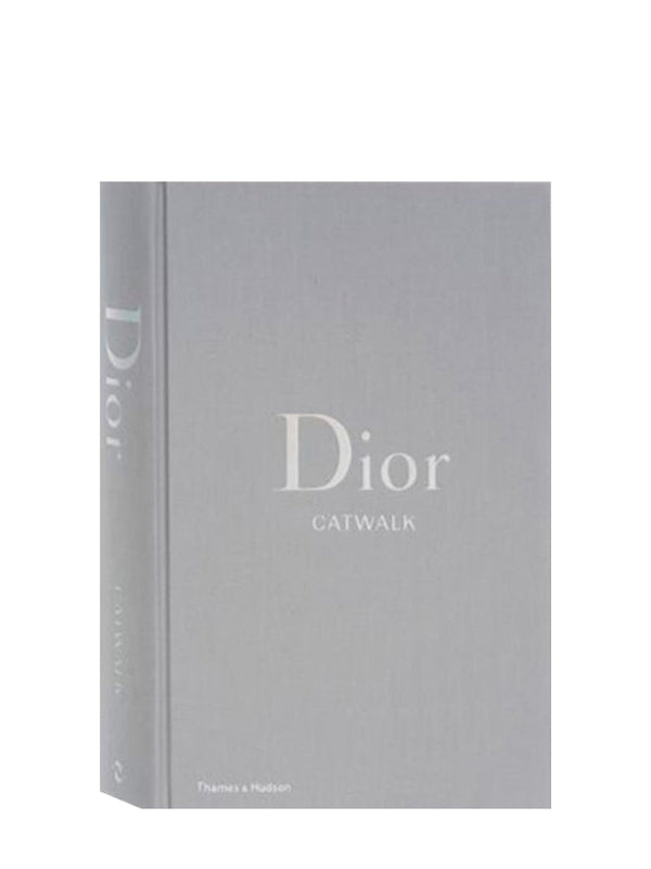 Grey cloth-covered book titled 'Dior Catwalk' is a 28 cm x 20 cm and 5 cm thick coffee table beauty.