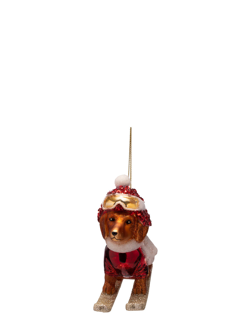 Dog on skis glass ornament