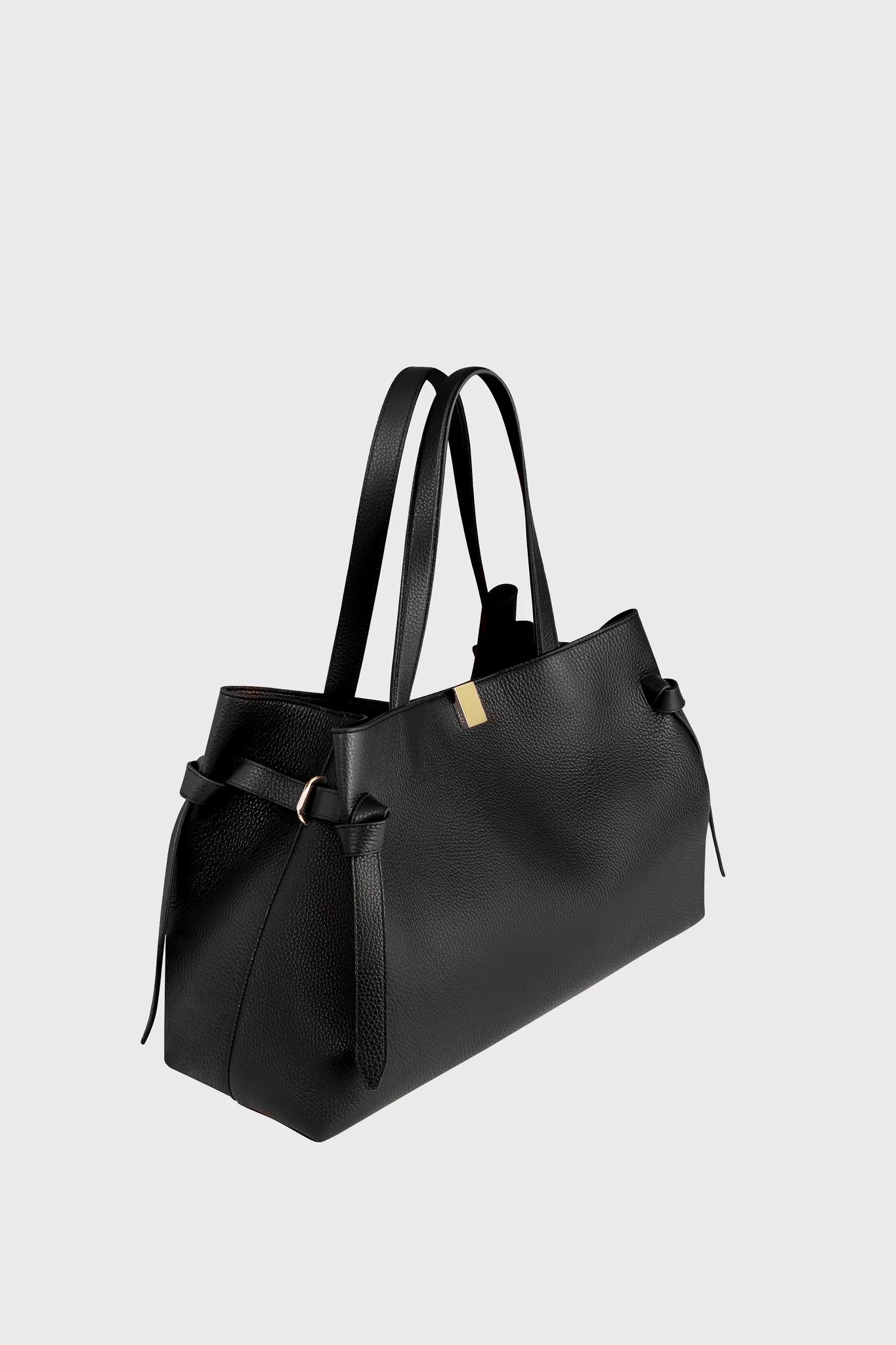 Womens' black handbag by Yuzefi on a light gray background