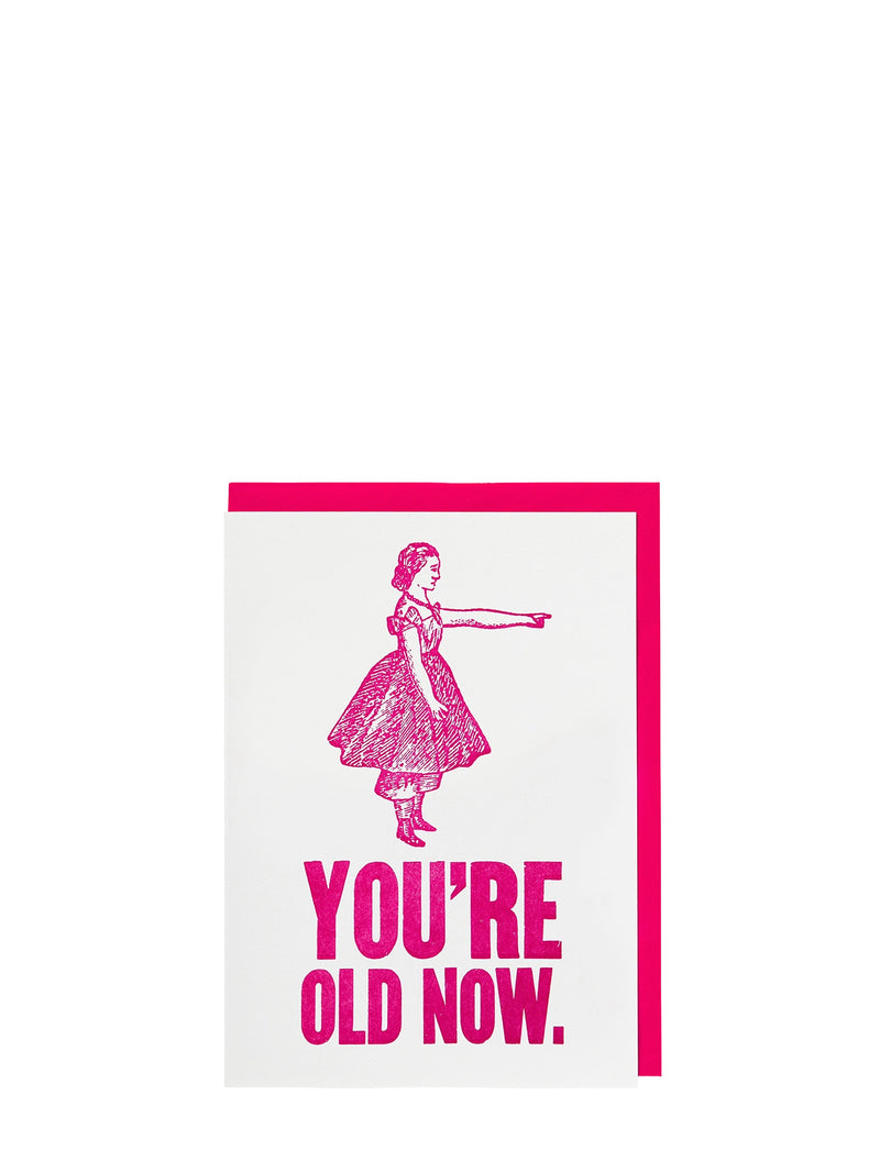 Illustration of a girl in a dress with text 'YOU'RE OLD NOW' in pink on a white background