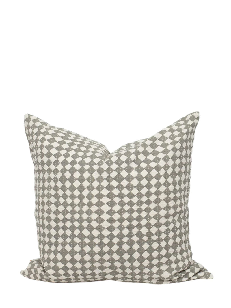 A grey cushion cover with a geometric triangle print, displayed on a plain background.
