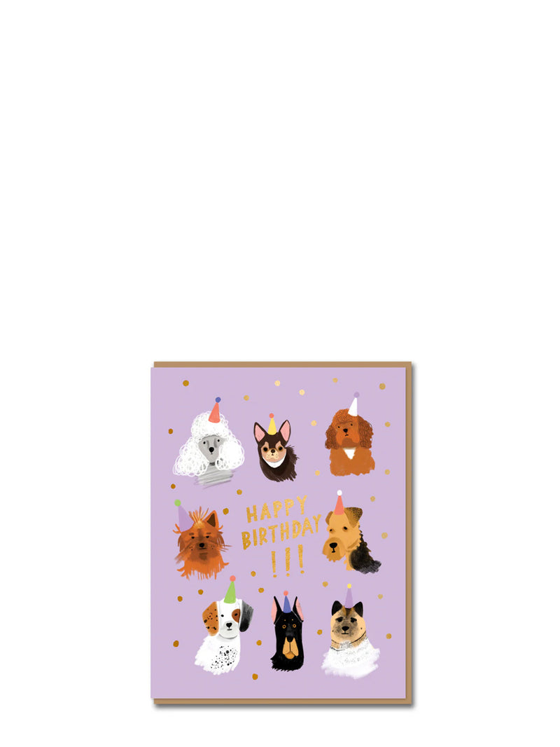 Birthday card with illustrations of dogs wearing party hats on a purple background