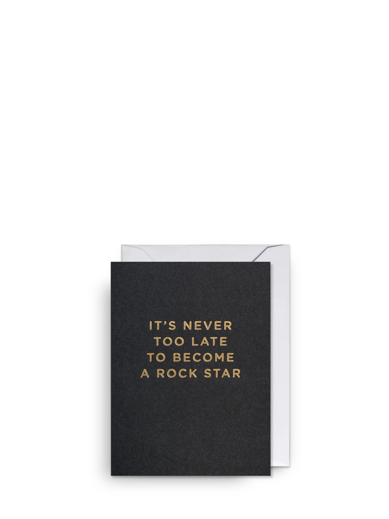 Black card with gold text 'It's never too late to become a rock star' on a white background