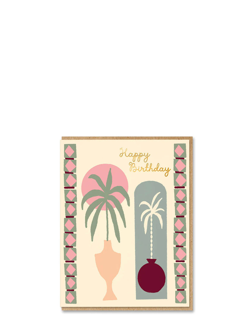 Decorative birthday card with palm tree design and 'Happy Birthday' text on a beige background.
