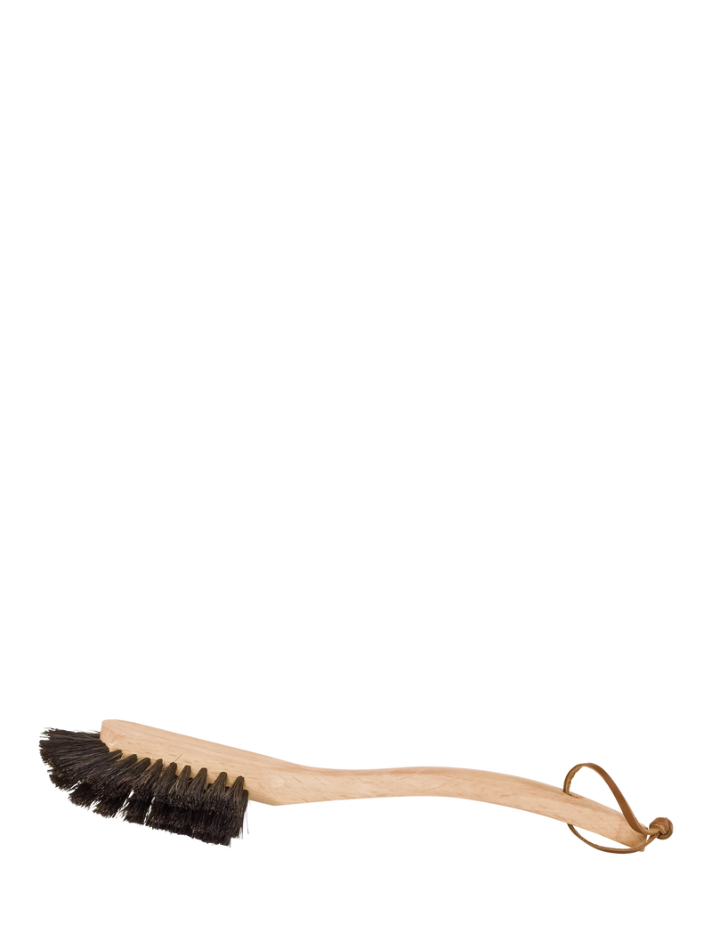 Wooden brush with bristle head on a white background