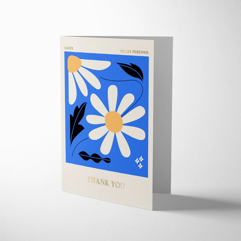 Greeting card with daisy design on a blue background