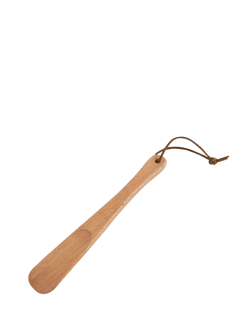 Wooden shoehorn with a brown string on a white background