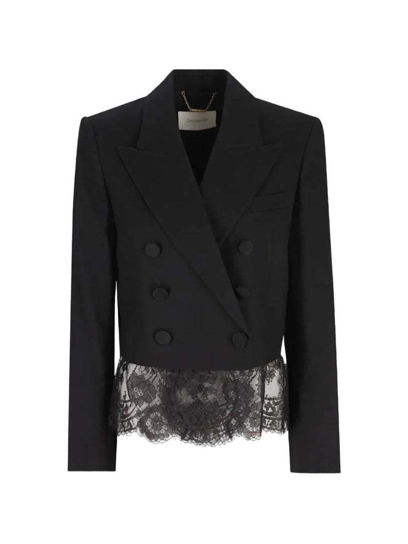 A black double-breasted blazer with structured shoulders and a sheer black lace ruffle hem, displayed on a clean white background.